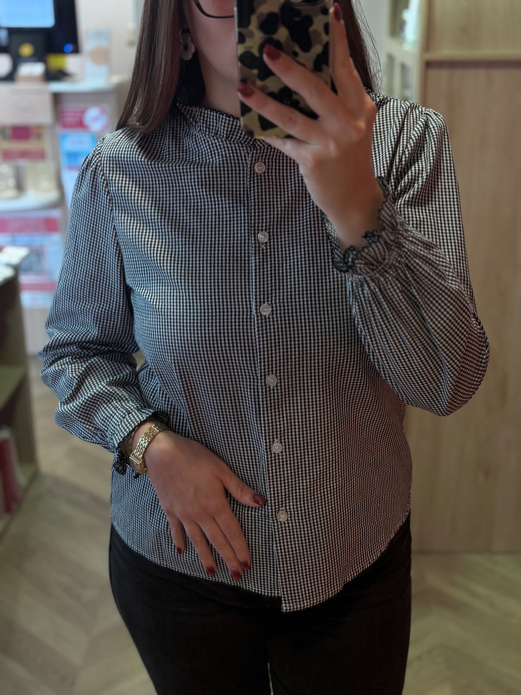 Chemise à carreaux noirs