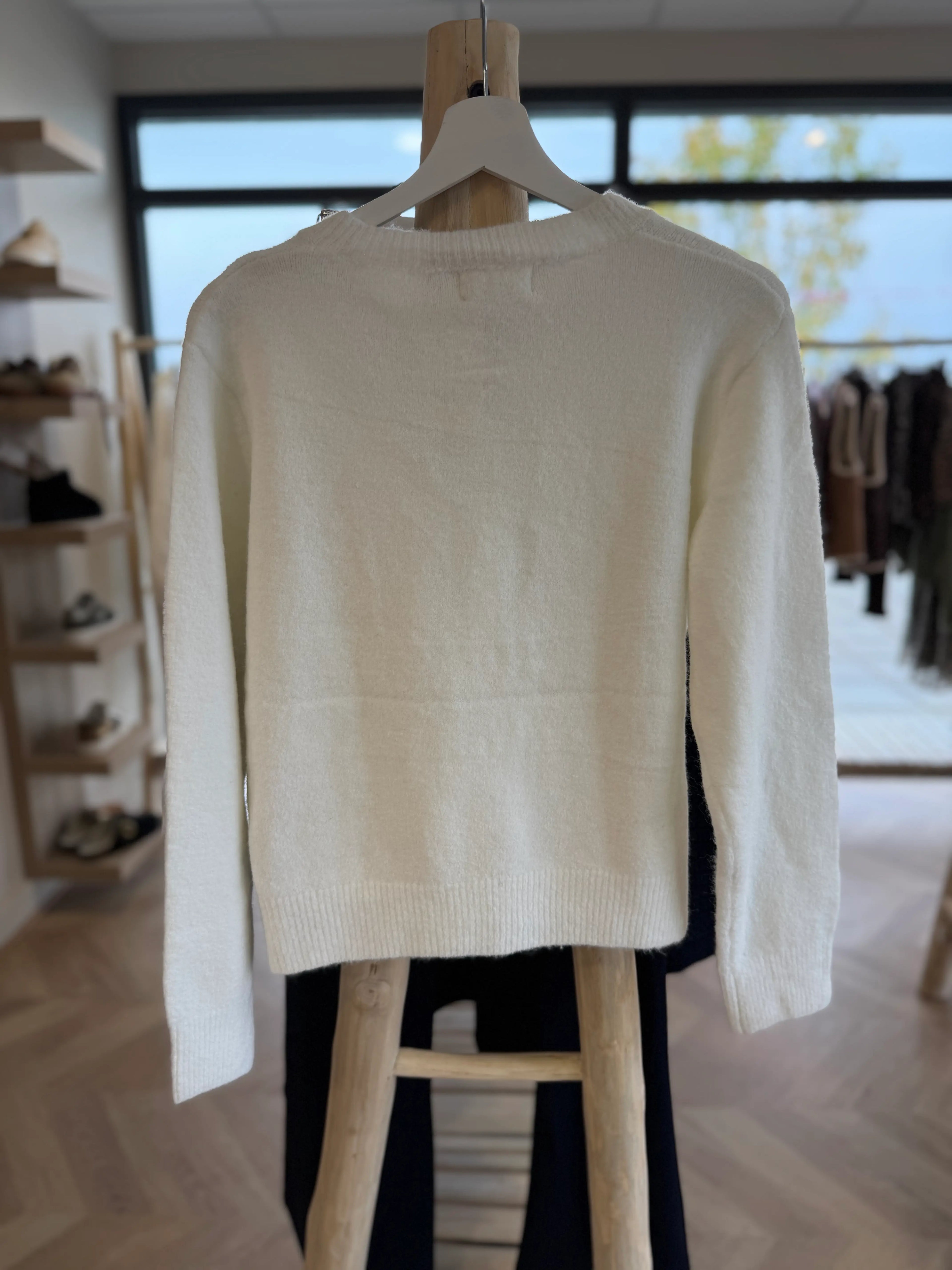 Gilet blanc à coeurs rouges