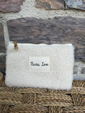 Pochette blanche, effet doux, avec inscription « MAMA love »