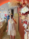 Robe courte à pois noir et blanc